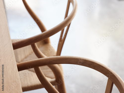 Modern wooden chairs at table