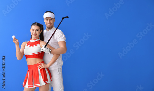 Cheerleader and golfer on c...