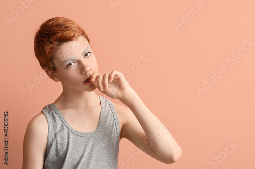 Teenage boy with dyed eyebr...