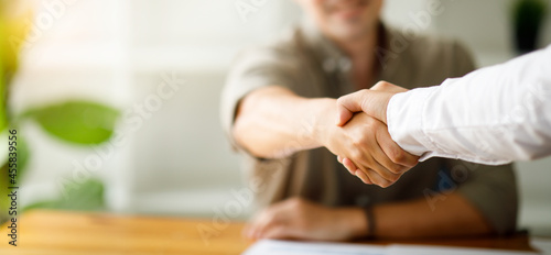 Close up of hand,business partners shaking hands . concept of partnership.