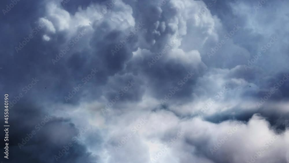 a thunderstorm struck across the sky with cumulonimbus clouds moving. a thunderstorm struck across the sky with cumulonimbus clouds moving.