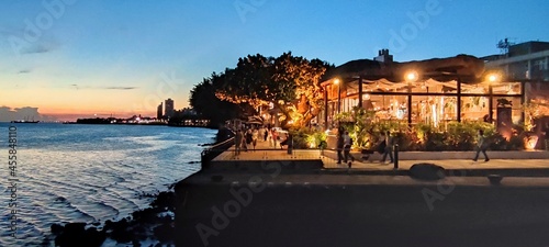 City Tamsui Bali District in Taipei, Taiwan reflecting in the Tamsui River at nice day photo