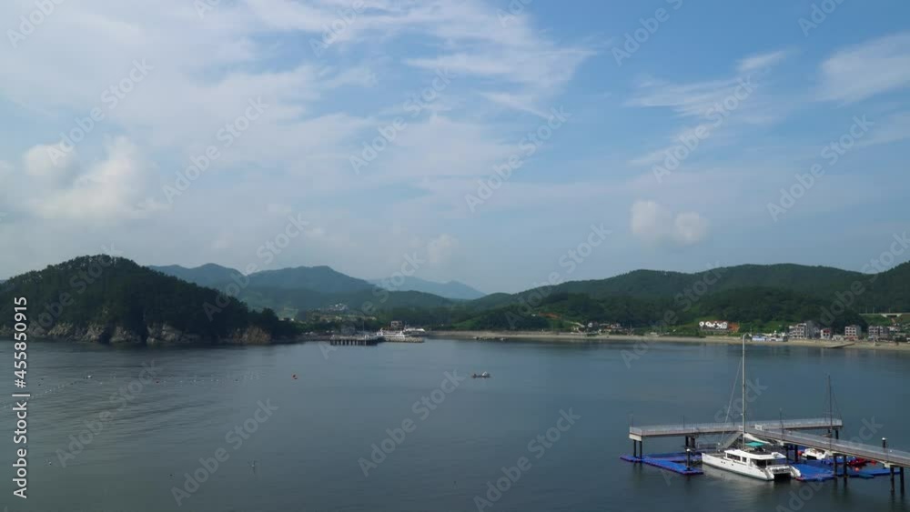 Panorama Of Islands By The Calm Ocean From Hanwha Resort Geoje Belvedere In South Korea. - wide shot Panorama Of Islands By The Calm Ocean From Hanwha Resort Geoje Belvedere In South Korea. - wide shot