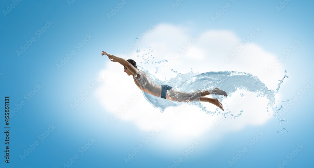 Fototapeta premium Professional man swimmer on a wave
