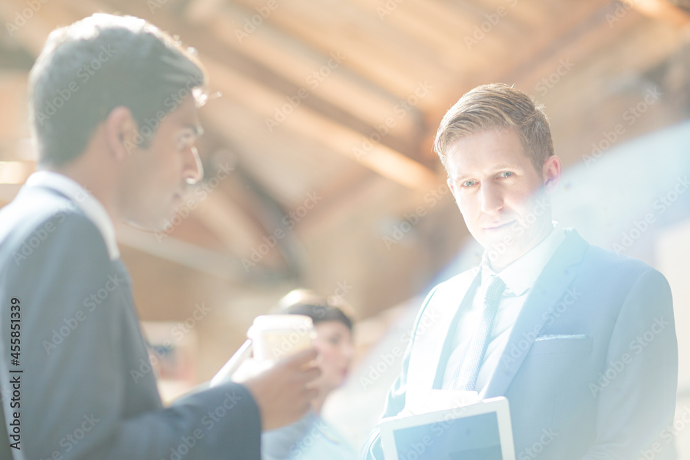 Businessmen talking in office Businessmen talking in office