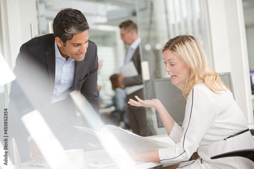 Business people talking in office Business people talking in office