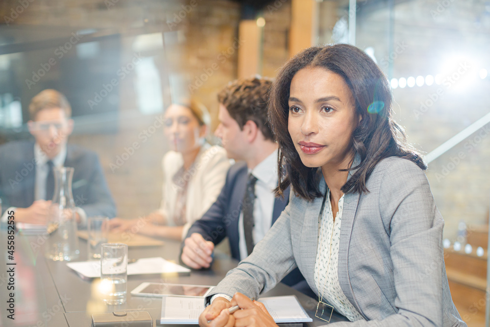 Business people talking in conference room Business people talking in conference room