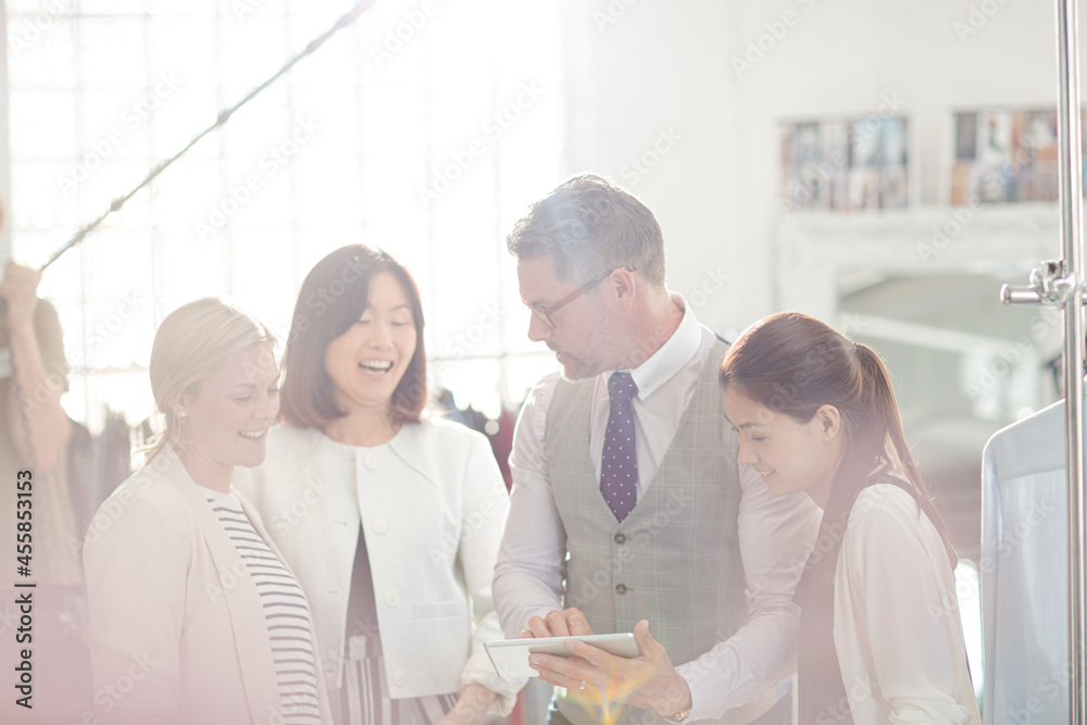 Fashion designers brainstorming in office Fashion designers brainstorming in office