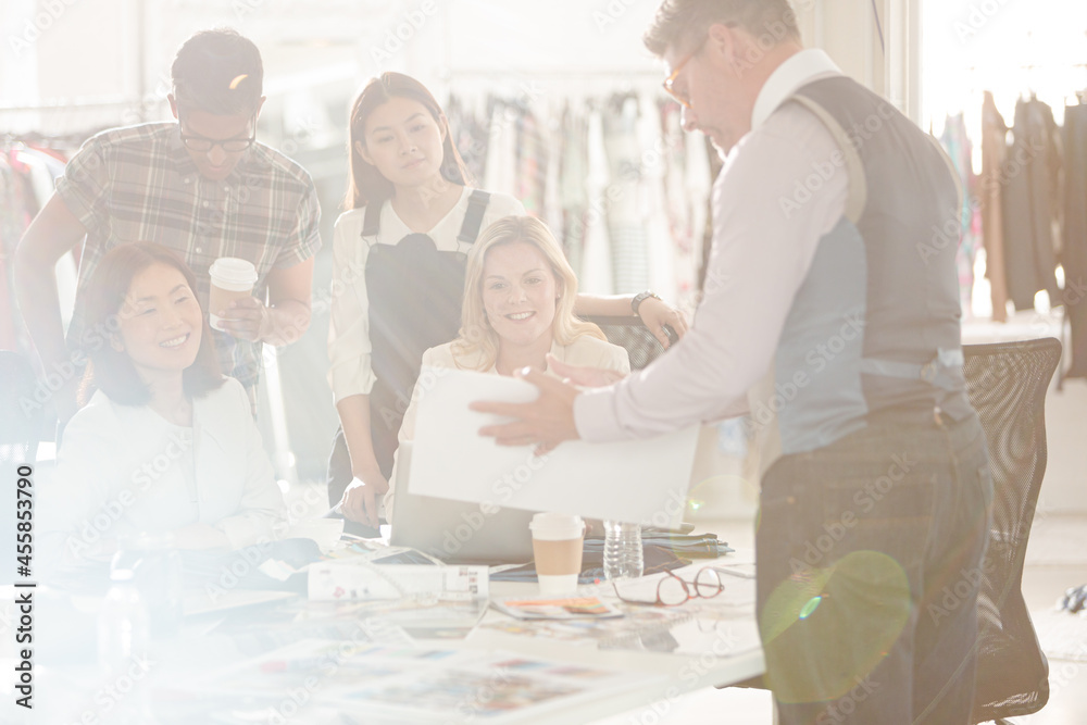 Fototapeta premium Fashion designers meeting in sunny office