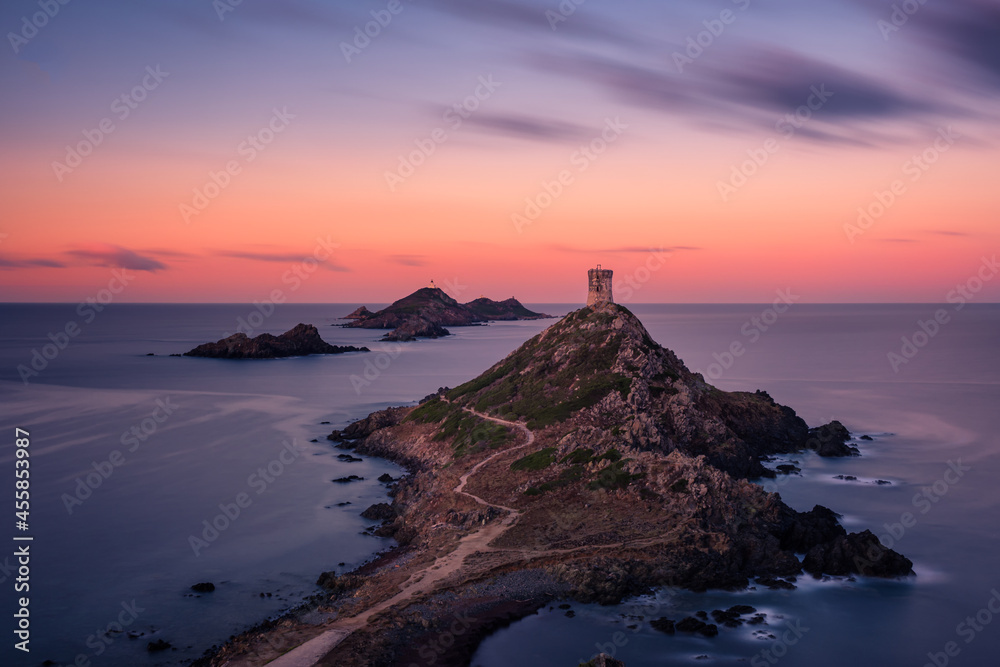 Sunrise over the Genoese tower and lighthouse at Pointe de la Parata and Les Iles Sanguinaires near Ajaccio in Corsica