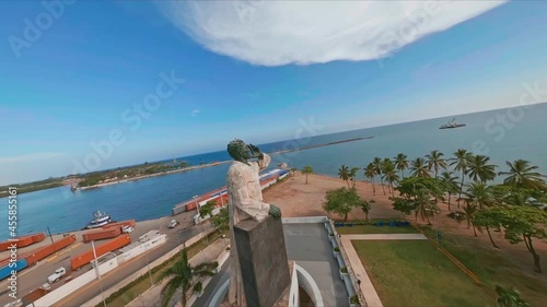 Statue Of Friar Antonio de Montesinos And Its Surroundings At The Seafront Of Santo Domingo In The Dominican Republic - drone FPV photo