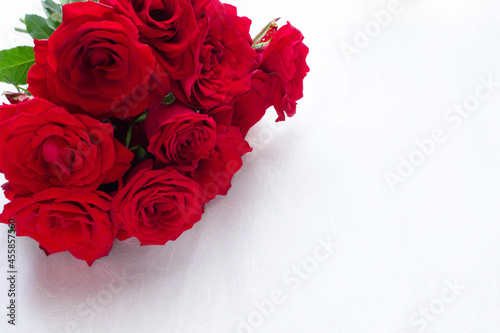Photo of a bouquet of red roses with a copy space.