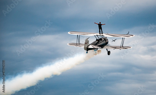 Fototapeta Naklejka Na Ścianę i Meble -  Wing Walking on Top of a Biplane
