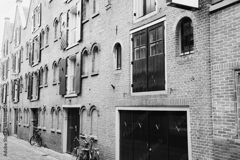 Exterior brick wall of building in perspective and black and white