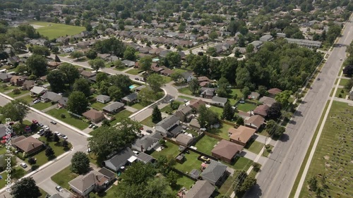Aerial flyover idyllic suburban of Welland surrounded by green landscape,Canada photo