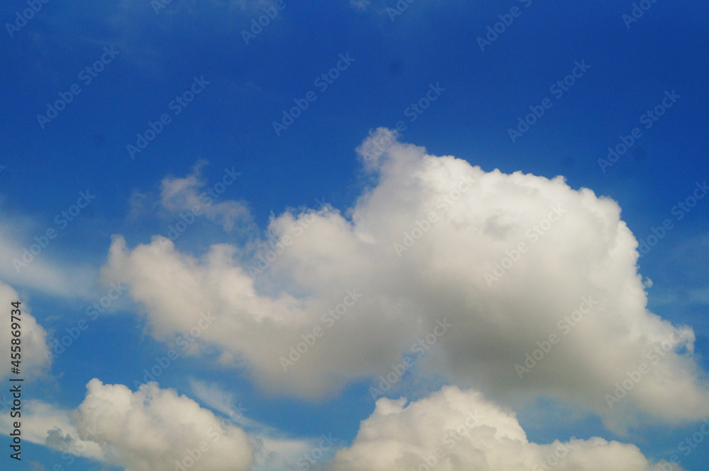 Blue sky, white clouds and buildings Blue sky, white clouds and buildings