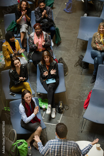 Conference audience clapping