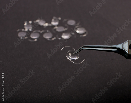 CLOSEUP PHOTO OF INTRAOCULAR LENS (IOL) FOR CATARACT SURGERY  photo