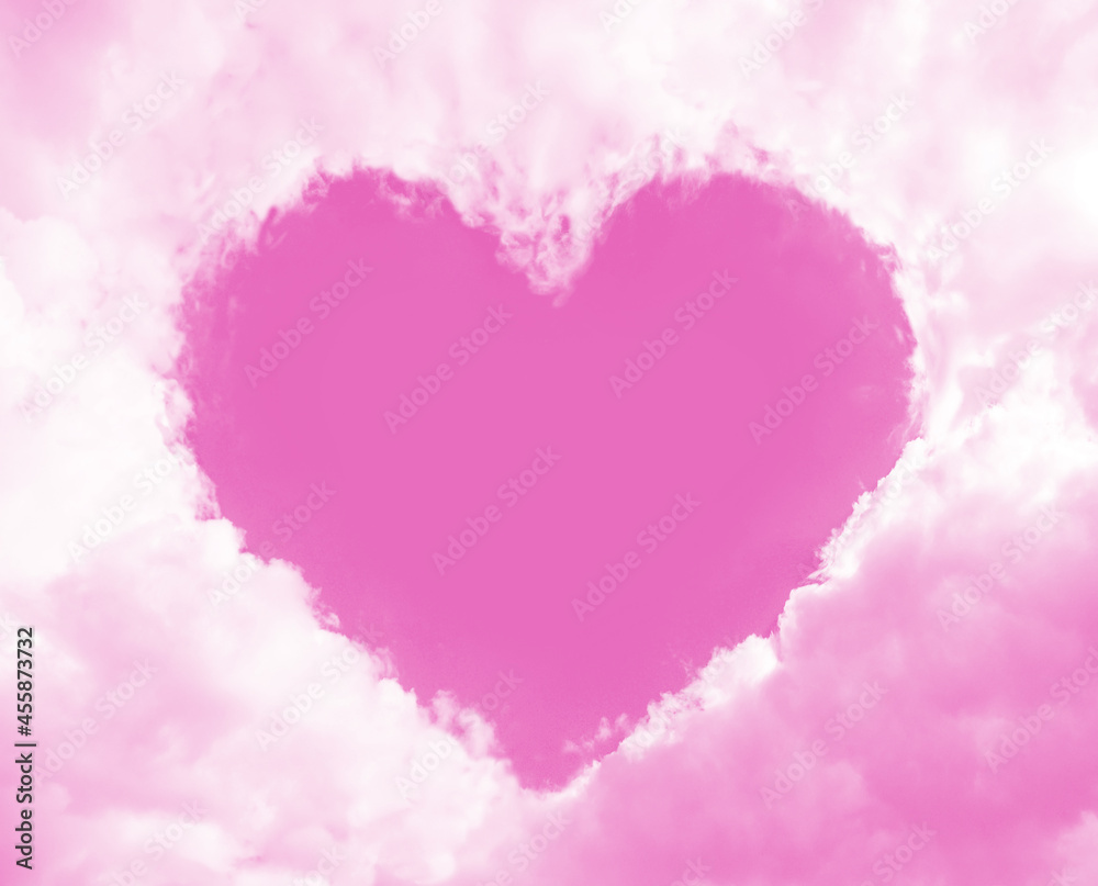 pink clouds in the sky forming a frame with heart shape. romantic fairy tale abstract background