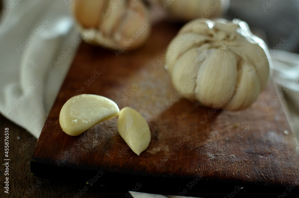 Bunch of Fresh garlic on wooden table Bunch of Fresh garlic on wooden table