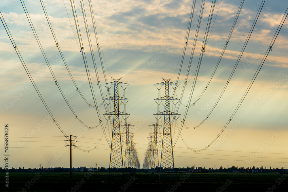 High voltage transmission line at sunset