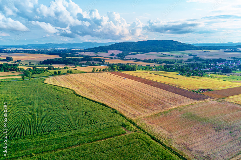 Aerial view of agricultural and green fields in countryside