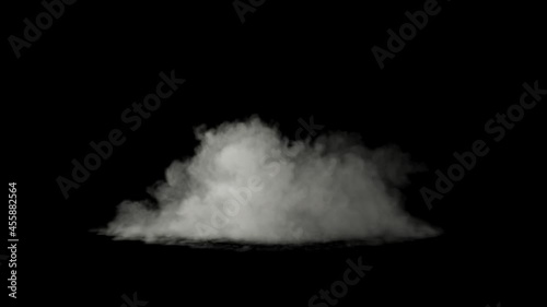 Puff of white smoke rushing towards the camera isolated on a black background photo