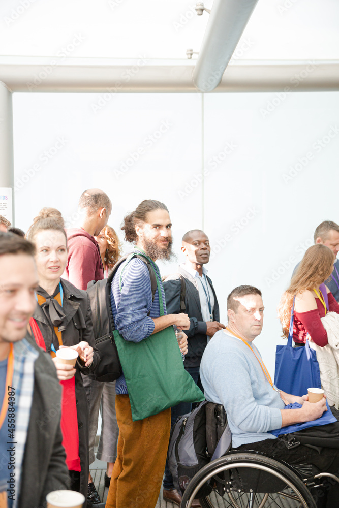 Fototapeta premium People entering auditorium hall