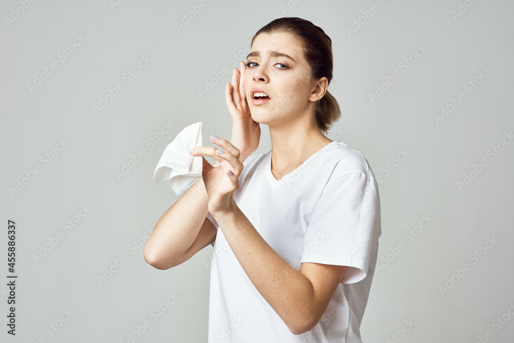 woman in white t-shirt handkerchief cold health problems woman in white t-shirt handkerchief cold health problems