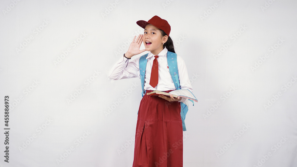 elementary school little girl screaming to the side isolated on white background