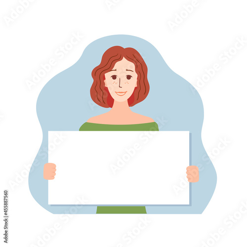 Сute young woman is holding an empty poster or banner.