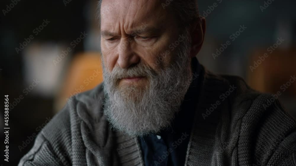Senior man working online in luxury cabinet. Portrait of old business man Senior man working online in luxury cabinet. Portrait of old business man