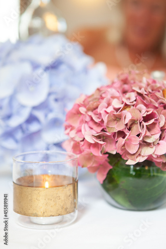 A beautiful multi-colored bouquet of hydrangeas on the table. Home comfort. High quality photo