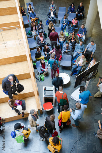 High angle view of people attending conference