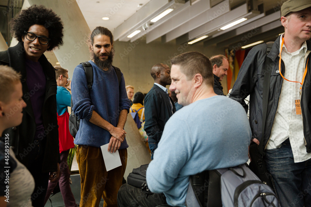 People talking during conference break People talking during conference break