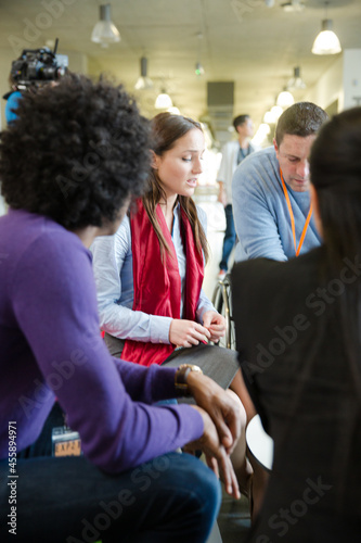 People talking during conference break © KOTO