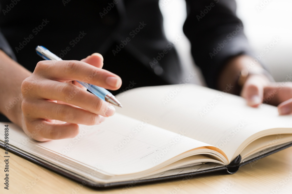 business person signing a document business person signing a document