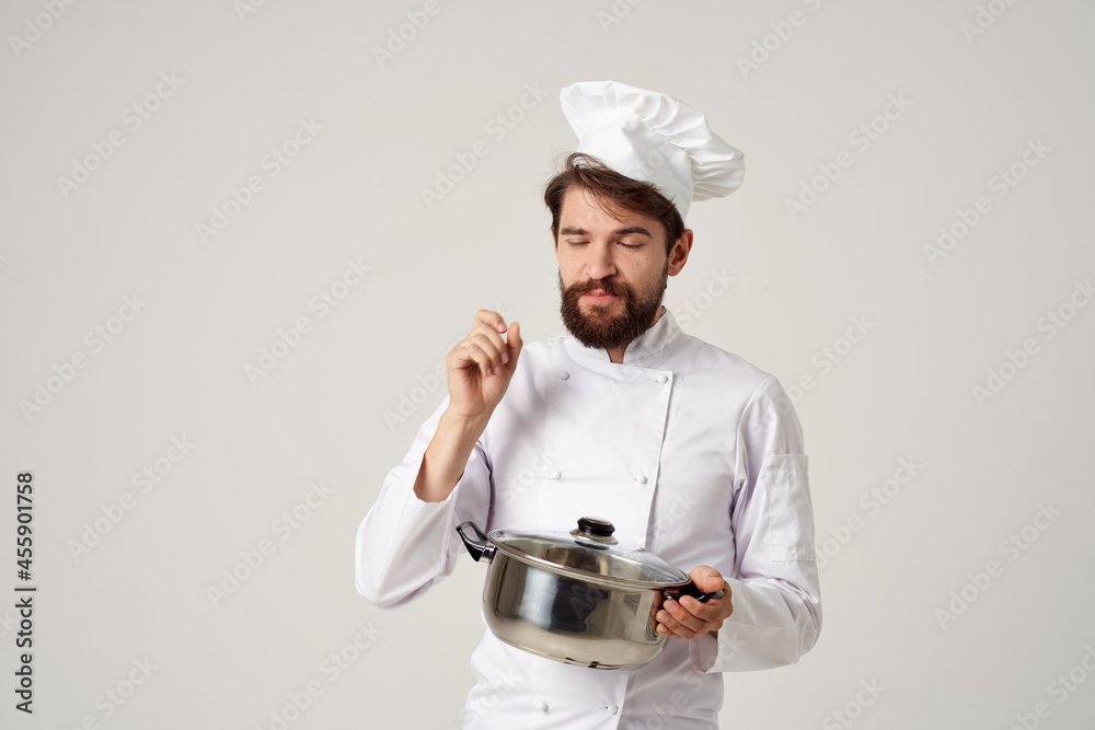 cheerful chef with a saucepan in his hands kitchen cooking work cheerful chef with a saucepan in his hands kitchen cooking work