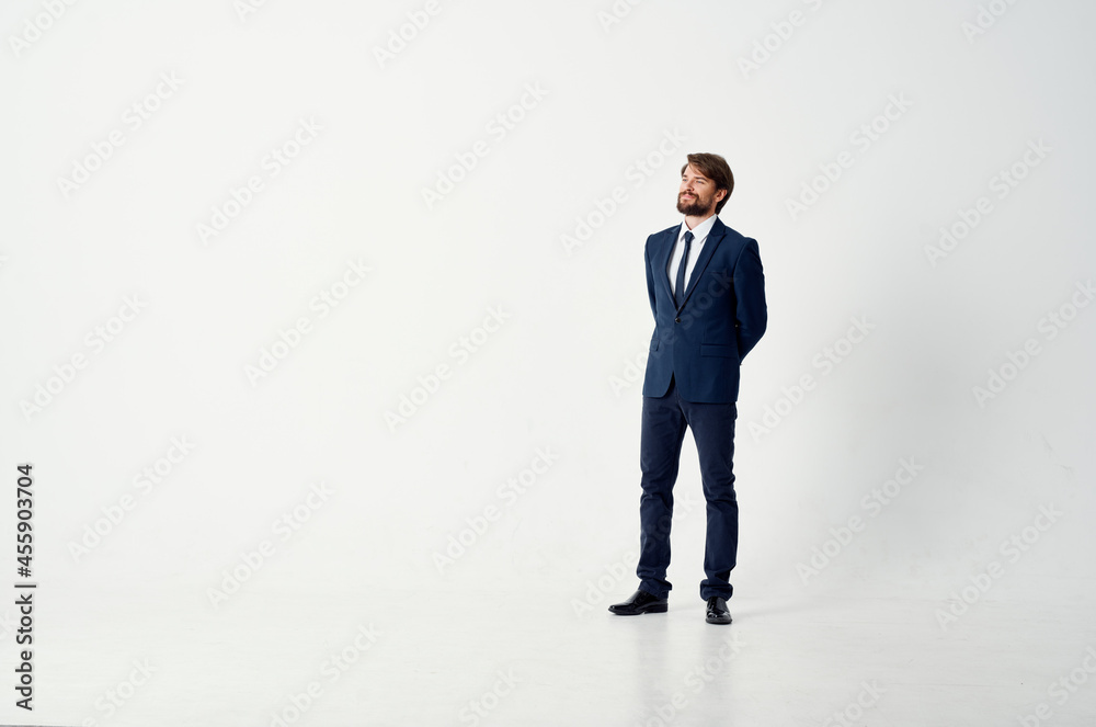 The man in a suit posing executive office Studio The man in a suit posing executive office Studio