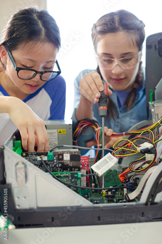 Wallpaper Mural Girl students assembling computer in classroom Torontodigital.ca