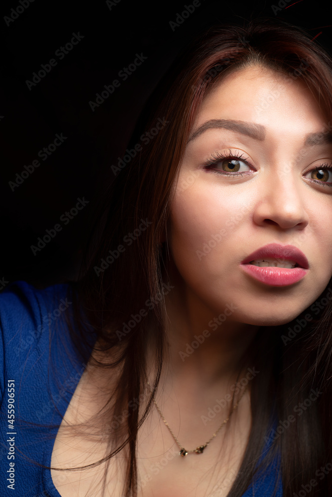 Caucasian model dressed in blue, happy beautiful and flirtatious Caucasian model dressed in blue, happy beautiful and flirtatious