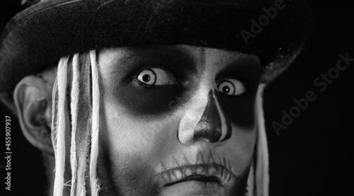 Photography Close-up shot of creepy man in skeleton makeup