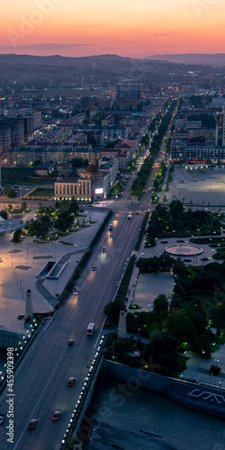 View of the city of Grozny from above from the Grozny City skyscraper complex at sunset. Vertical format. photo