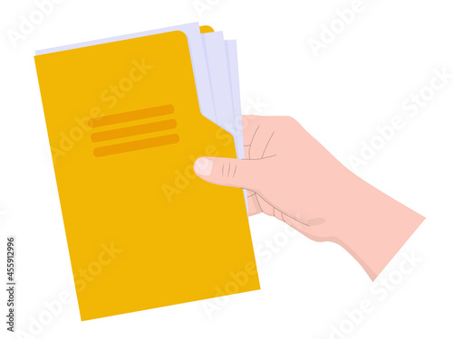 Hand holds a yellow folder with documents. 