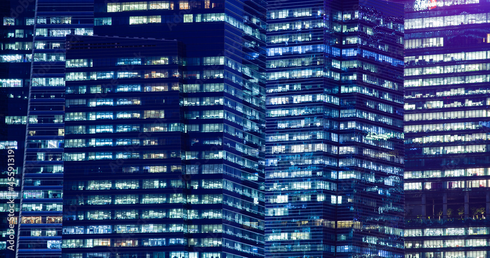 skyscrapers windows at night in Singapore skyscrapers windows at night in Singapore