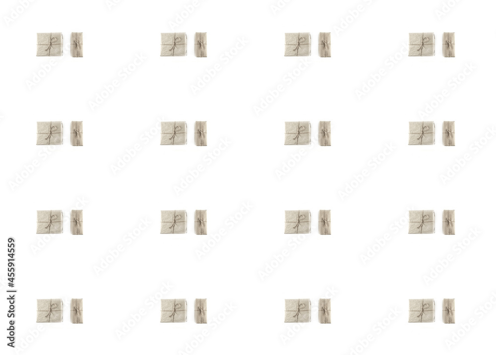 set of gifts in kraft paper on a white isolated background pattern festive