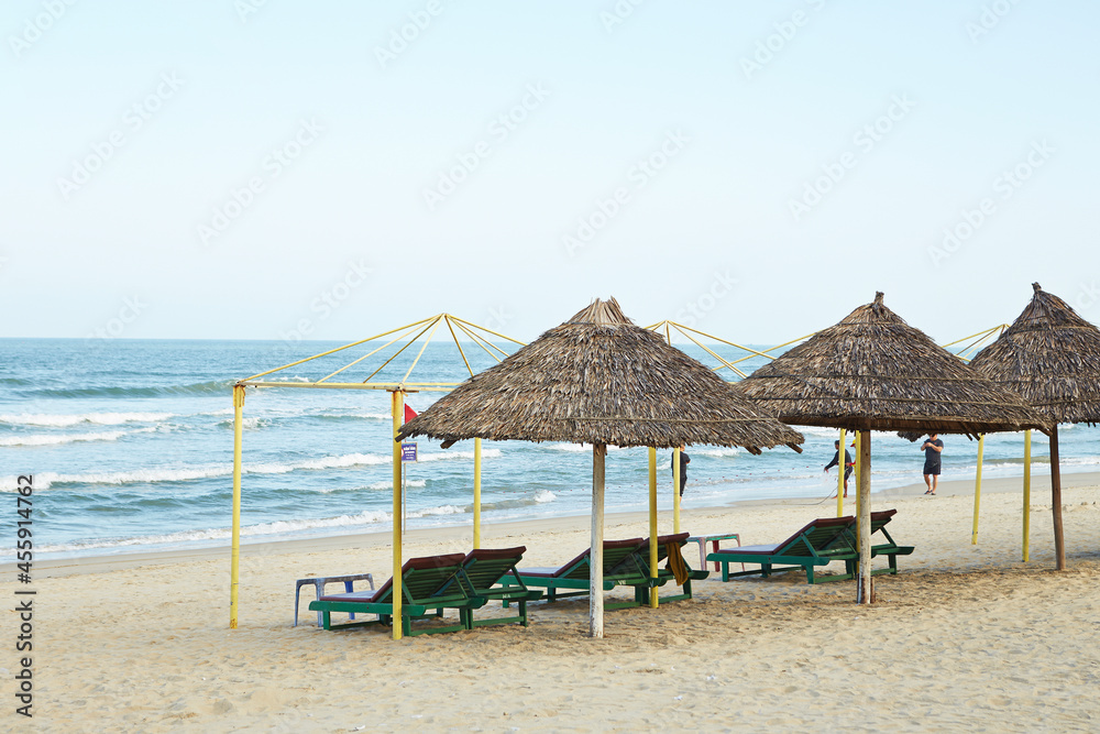 beach chairs and umbrellas on the beach