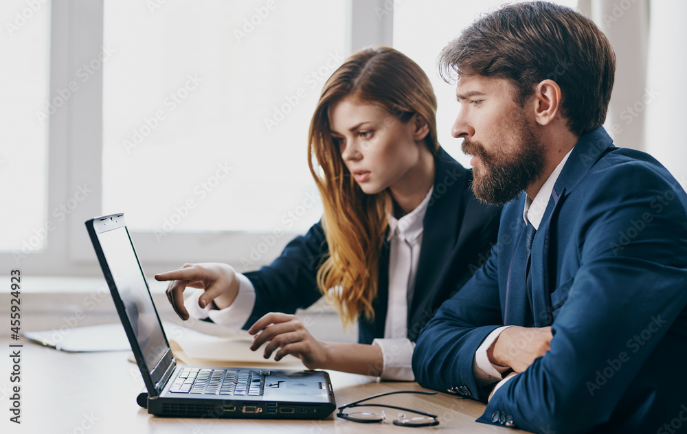 business colleagues at work office laptop emotions finance business colleagues at work office laptop emotions finance
