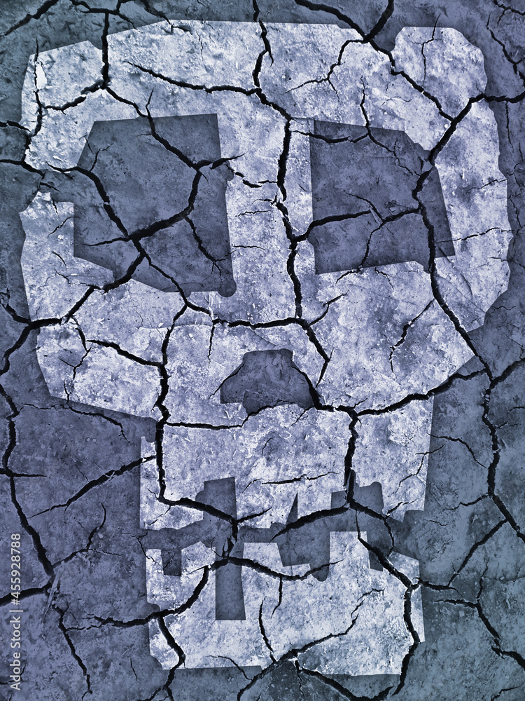 Distressed dry cracked earth with symbol of skull. Photo-montage with Dry cracked earth and stylized human skull. Symbol of catastrophic drought and global warming. Distressed dry cracked earth with symbol of skull. Photo-montage with Dry cracked earth and stylized human skull. Symbol of catastrophic drought and global warming.