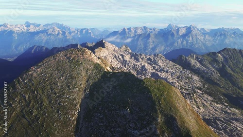 Morning flight around Krn mountain. Julian Alps, Soca valley, Slovenia